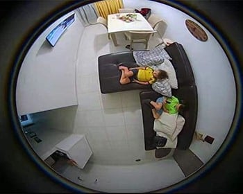 Securelite footage of a family in the living room